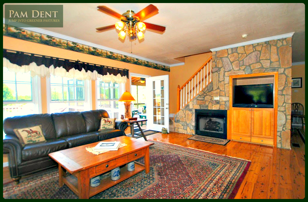 Shenandoah Valley Horse Farm | 205 Shadow Ridge Ln | Family room with entertainment center set into a lovely rock wall